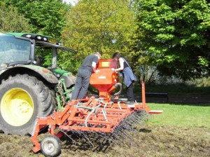 Performance Issues; Cath Scott makes sure the seed is dissapearing at the right rate.