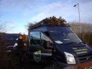 Willow rods attached safely to the roof of a minibus