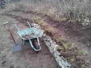 Turf added to the top of the wall for stability and wildlife habitat.