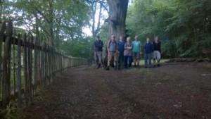 A great picture of  not only the completed fence (which gives you a good idea how long it was!), but also a happy albeit tired volunteer group. 